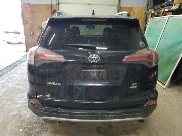 Photo 5 VIN: 2T3JFREV5GW494700 - TOYOTA RAV4 SE 