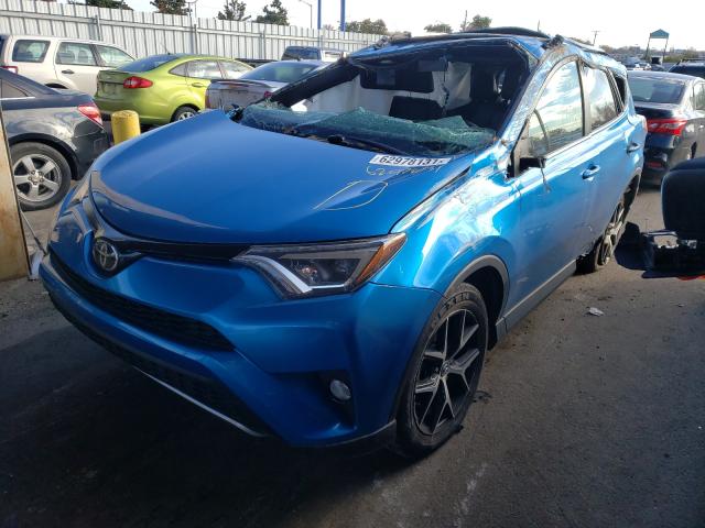 Photo 1 VIN: 2T3JFREV6HW615946 - TOYOTA RAV4 SE 