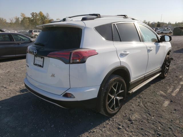 Photo 3 VIN: 2T3JFREV7HW570712 - TOYOTA RAV4 SE 