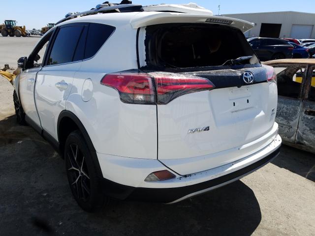 Photo 2 VIN: 2T3JFREV7JW749841 - TOYOTA RAV4 SE 