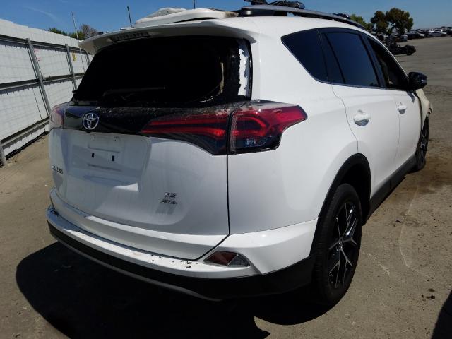 Photo 3 VIN: 2T3JFREV7JW749841 - TOYOTA RAV4 SE 