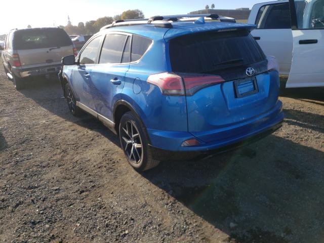 Photo 2 VIN: 2T3JFREV9GW438937 - TOYOTA RAV4 SE 