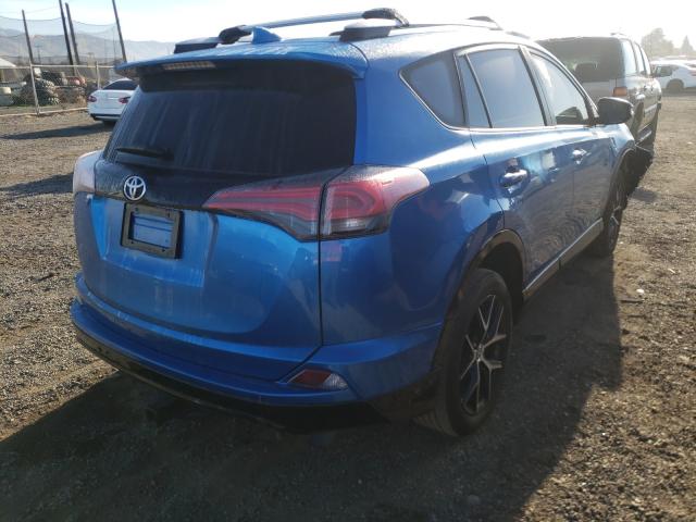 Photo 3 VIN: 2T3JFREV9GW438937 - TOYOTA RAV4 SE 