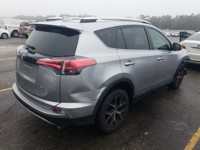 Photo 3 VIN: 2T3NFREV0GW256190 - TOYOTA RAV4 SE 