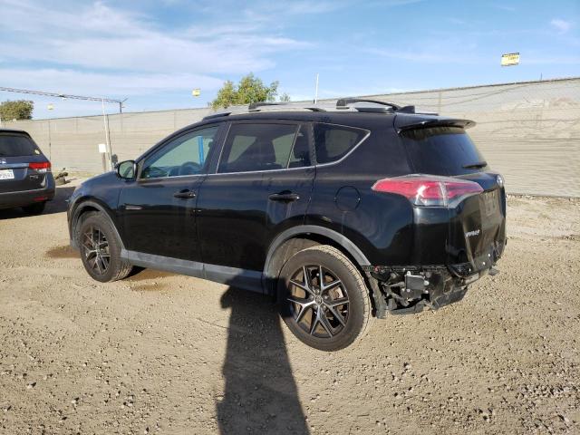 Photo 1 VIN: 2T3NFREV0GW297628 - TOYOTA RAV4 SE 