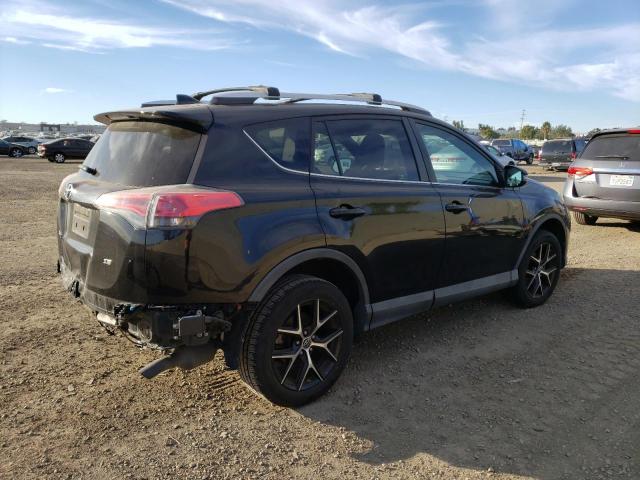 Photo 2 VIN: 2T3NFREV0GW297628 - TOYOTA RAV4 SE 