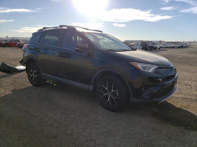 Photo 3 VIN: 2T3NFREV0GW297628 - TOYOTA RAV4 SE 