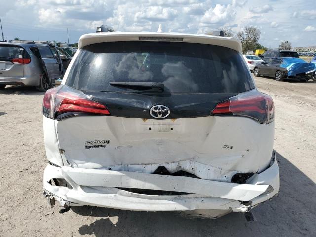 Photo 5 VIN: 2T3NFREV1JW466966 - TOYOTA RAV4 SE 