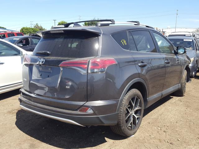 Photo 3 VIN: 2T3NFREV3GW261058 - TOYOTA RAV4 SE 