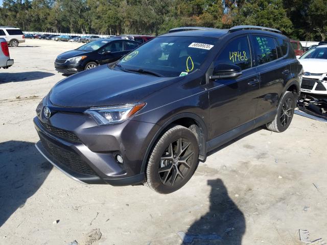 Photo 1 VIN: 2T3NFREV3GW299616 - TOYOTA RAV4 SE 