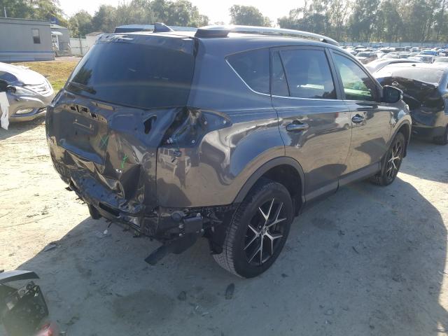 Photo 3 VIN: 2T3NFREV3GW299616 - TOYOTA RAV4 SE 