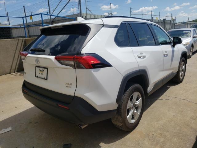 Photo 3 VIN: 2T3P1RFV1KW027418 - TOYOTA RAV4 XLE 