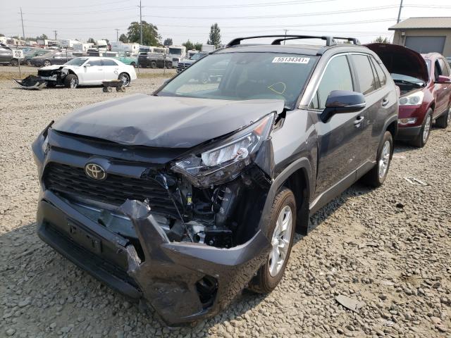 Photo 1 VIN: 2T3P1RFV5KW054475 - TOYOTA RAV4 XLE 