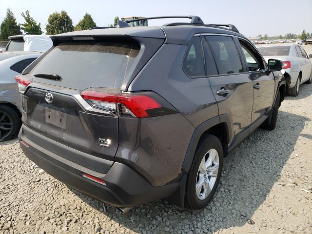 Photo 3 VIN: 2T3P1RFV5KW054475 - TOYOTA RAV4 XLE 