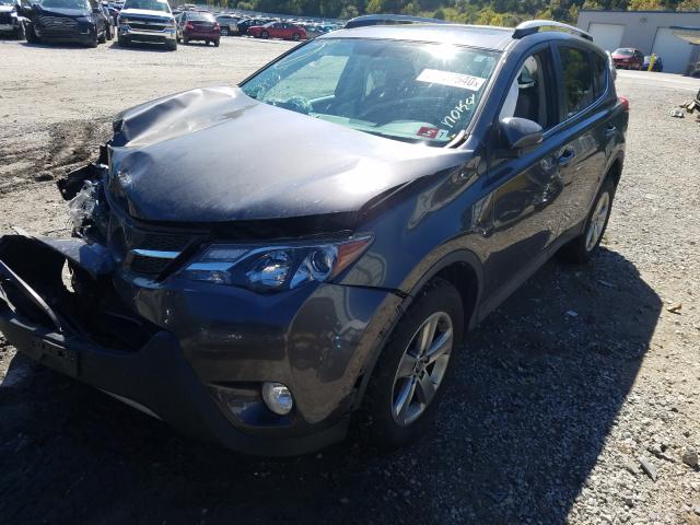 Photo 1 VIN: 2T3RFREV0FW354068 - TOYOTA RAV4 XLE 