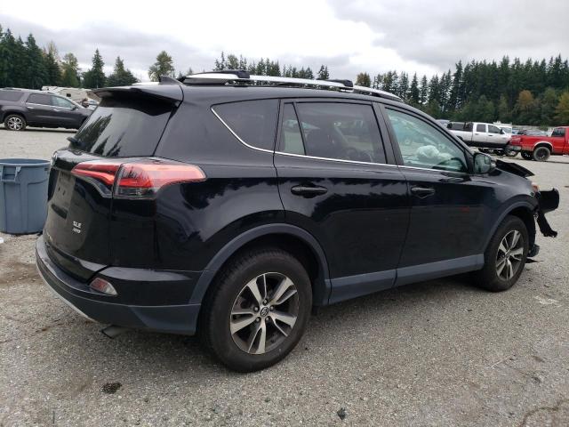 Photo 2 VIN: 2T3RFREV0GW437260 - TOYOTA RAV4 XLE 