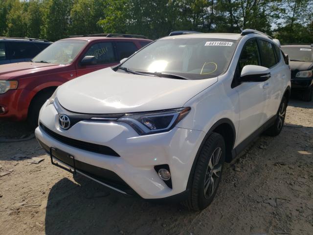 Photo 1 VIN: 2T3RFREV0GW460473 - TOYOTA RAV4 XLE 