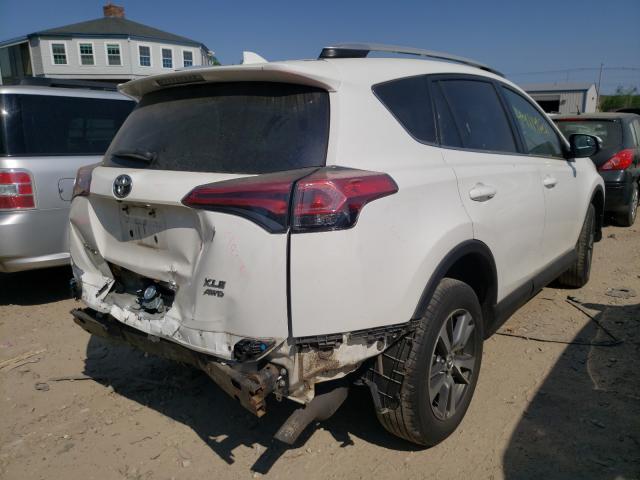 Photo 3 VIN: 2T3RFREV0GW460473 - TOYOTA RAV4 XLE 