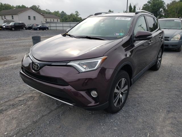 Photo 1 VIN: 2T3RFREV0GW517593 - TOYOTA RAV4 XLE 