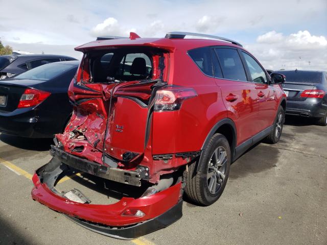 Photo 3 VIN: 2T3RFREV0GW518016 - TOYOTA RAV4 XLE 