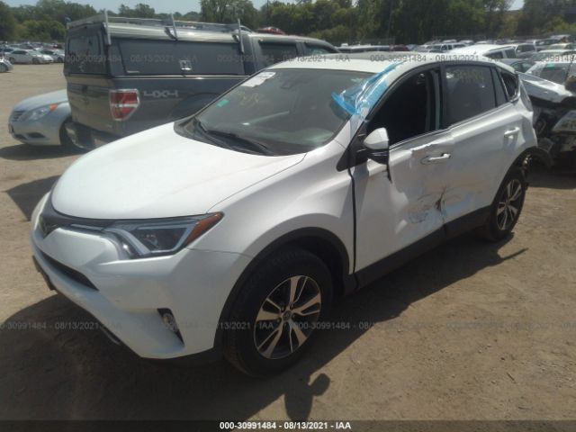 Photo 1 VIN: 2T3RFREV0JW706204 - TOYOTA RAV4 