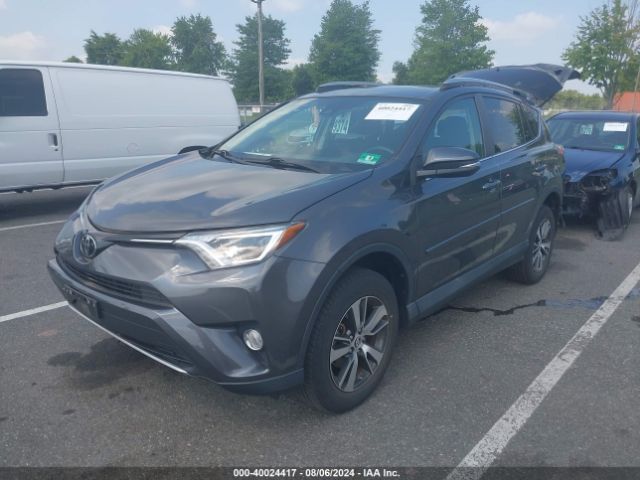 Photo 1 VIN: 2T3RFREV0JW814452 - TOYOTA RAV4 