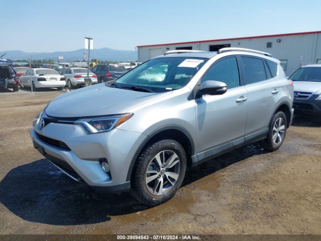 Photo 1 VIN: 2T3RFREV2GW434733 - TOYOTA RAV4 