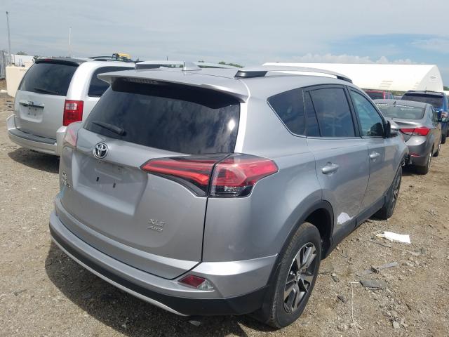 Photo 3 VIN: 2T3RFREV2GW455209 - TOYOTA RAV4 XLE 