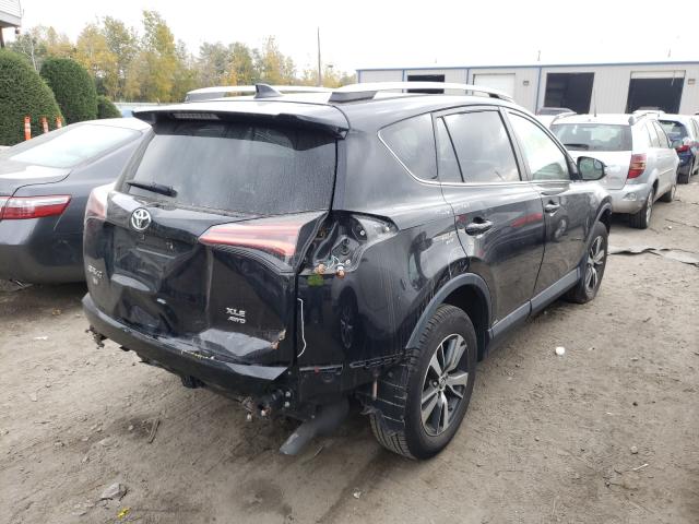 Photo 3 VIN: 2T3RFREV2GW460927 - TOYOTA RAV4 XLE 