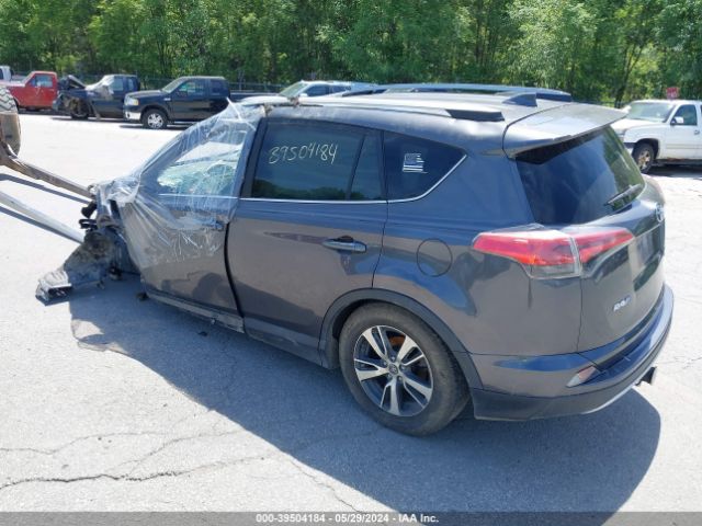 Photo 2 VIN: 2T3RFREV2HW607295 - TOYOTA RAV4 XLE 