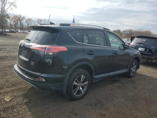 Photo 2 VIN: 2T3RFREV2HW659378 - TOYOTA RAV4 XLE 