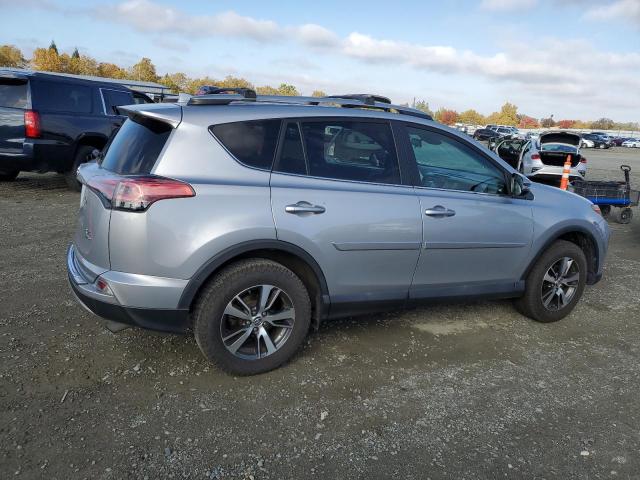 Photo 2 VIN: 2T3RFREV2HW692865 - TOYOTA RAV4 XLE 