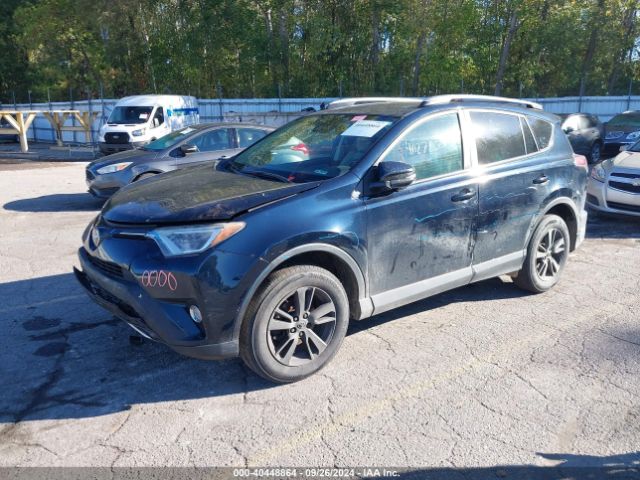 Photo 1 VIN: 2T3RFREV2JW716040 - TOYOTA RAV4 