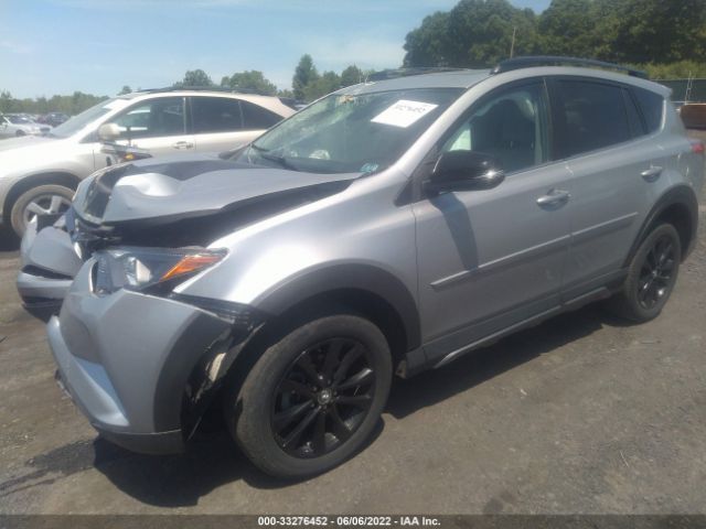 Photo 1 VIN: 2T3RFREV2JW720394 - TOYOTA RAV4 