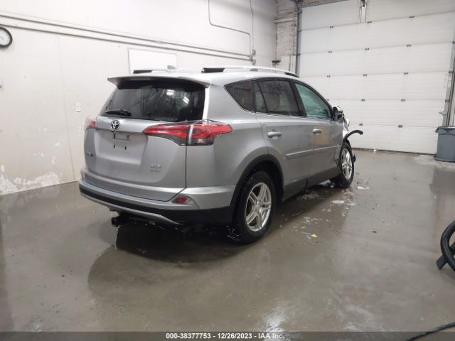 Photo 3 VIN: 2T3RFREV2JW766761 - TOYOTA RAV4 