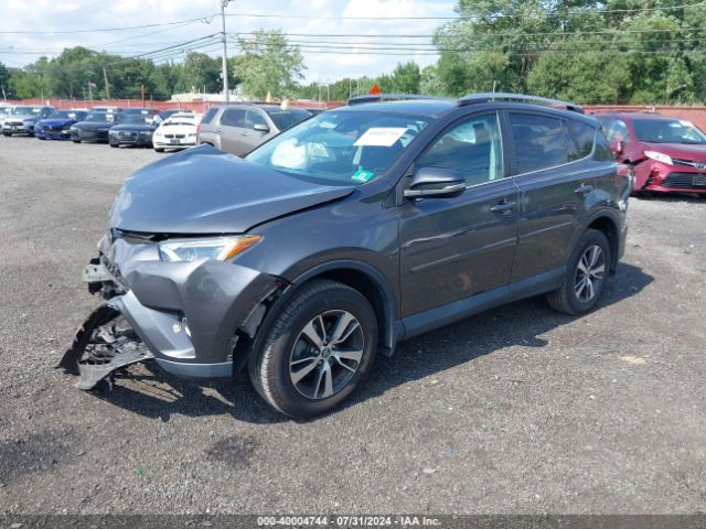 Photo 1 VIN: 2T3RFREV2JW801038 - TOYOTA RAV4 