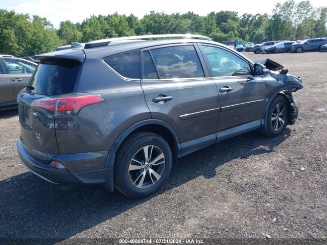 Photo 3 VIN: 2T3RFREV2JW801038 - TOYOTA RAV4 