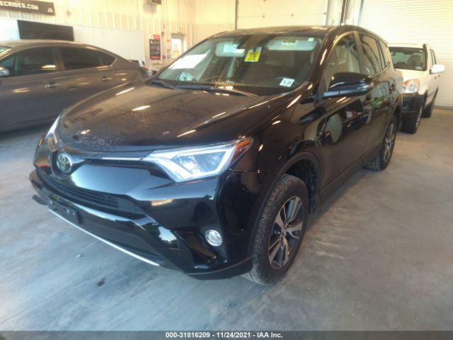 Photo 1 VIN: 2T3RFREV2JW802402 - TOYOTA RAV4 