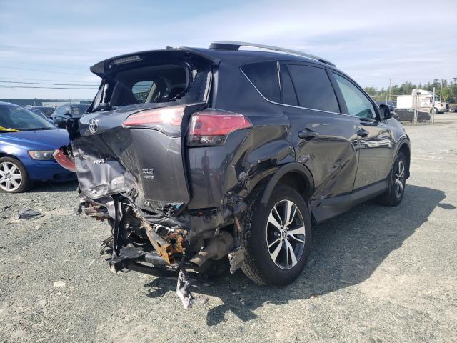 Photo 3 VIN: 2T3RFREV3GW430285 - TOYOTA RAV4 XLE 