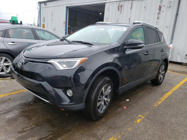 Photo 1 VIN: 2T3RFREV3GW488915 - TOYOTA RAV4 XLE 