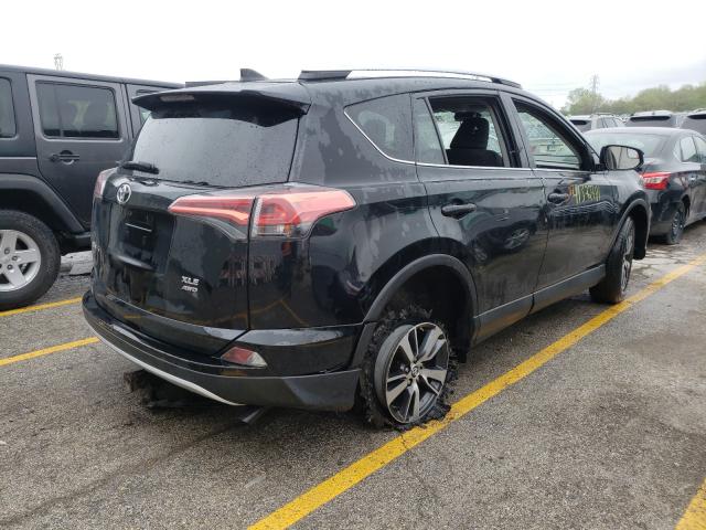 Photo 3 VIN: 2T3RFREV3GW488915 - TOYOTA RAV4 XLE 