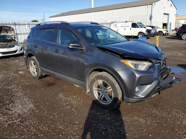 Photo 3 VIN: 2T3RFREV3GW499218 - TOYOTA RAV4 XLE 