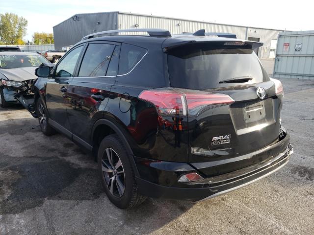 Photo 2 VIN: 2T3RFREV3HW688310 - TOYOTA RAV4 XLE 