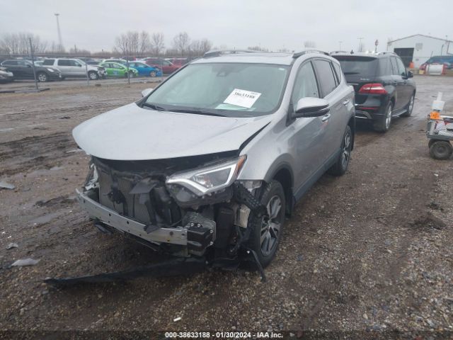 Photo 1 VIN: 2T3RFREV3JW742694 - TOYOTA RAV4 