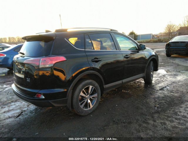 Photo 3 VIN: 2T3RFREV3JW760760 - TOYOTA RAV4 