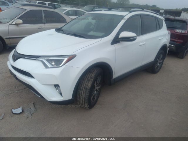 Photo 1 VIN: 2T3RFREV3JW790275 - TOYOTA RAV4 