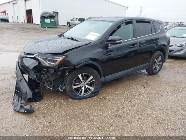 Photo 1 VIN: 2T3RFREV3JW814588 - TOYOTA RAV4 