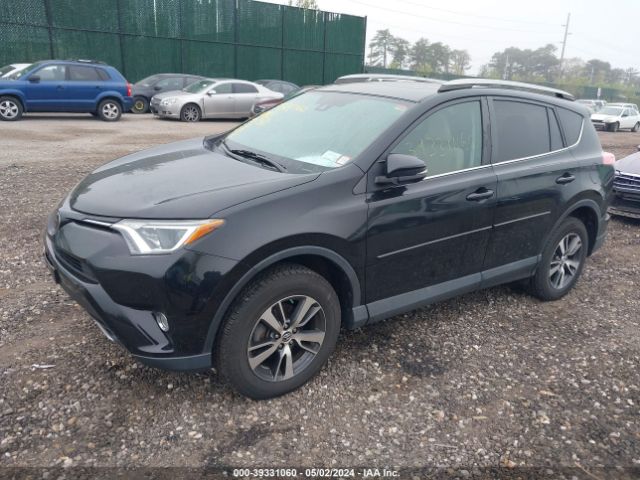 Photo 1 VIN: 2T3RFREV3JW822609 - TOYOTA RAV4 