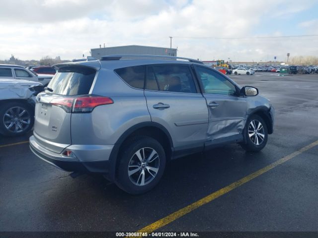 Photo 3 VIN: 2T3RFREV3JW854816 - TOYOTA RAV4 