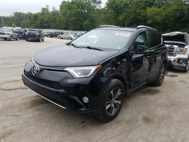 Photo 1 VIN: 2T3RFREV4GW528712 - TOYOTA RAV4 XLE 